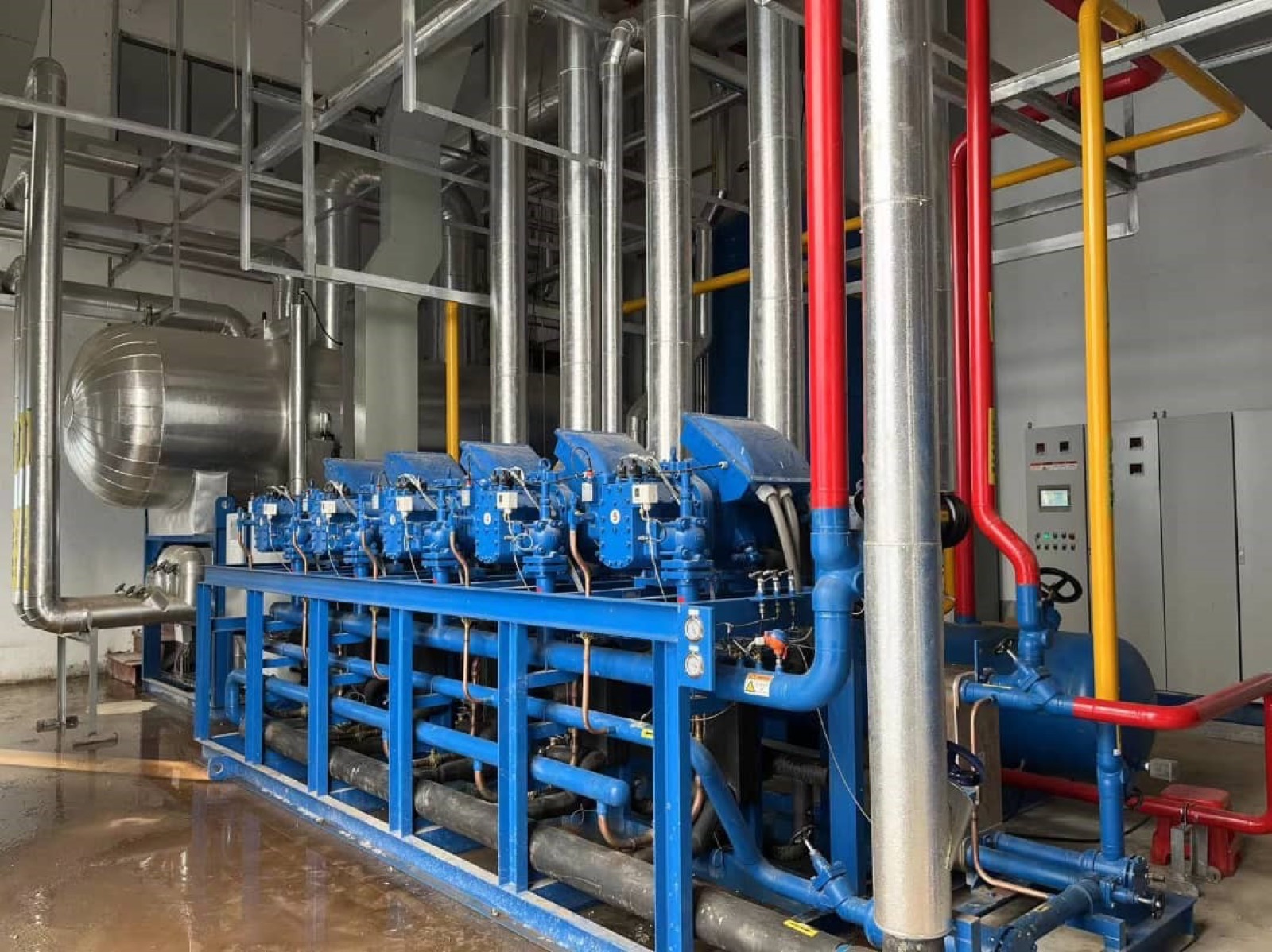Industrial cooling skid supporting poultry plant utilities