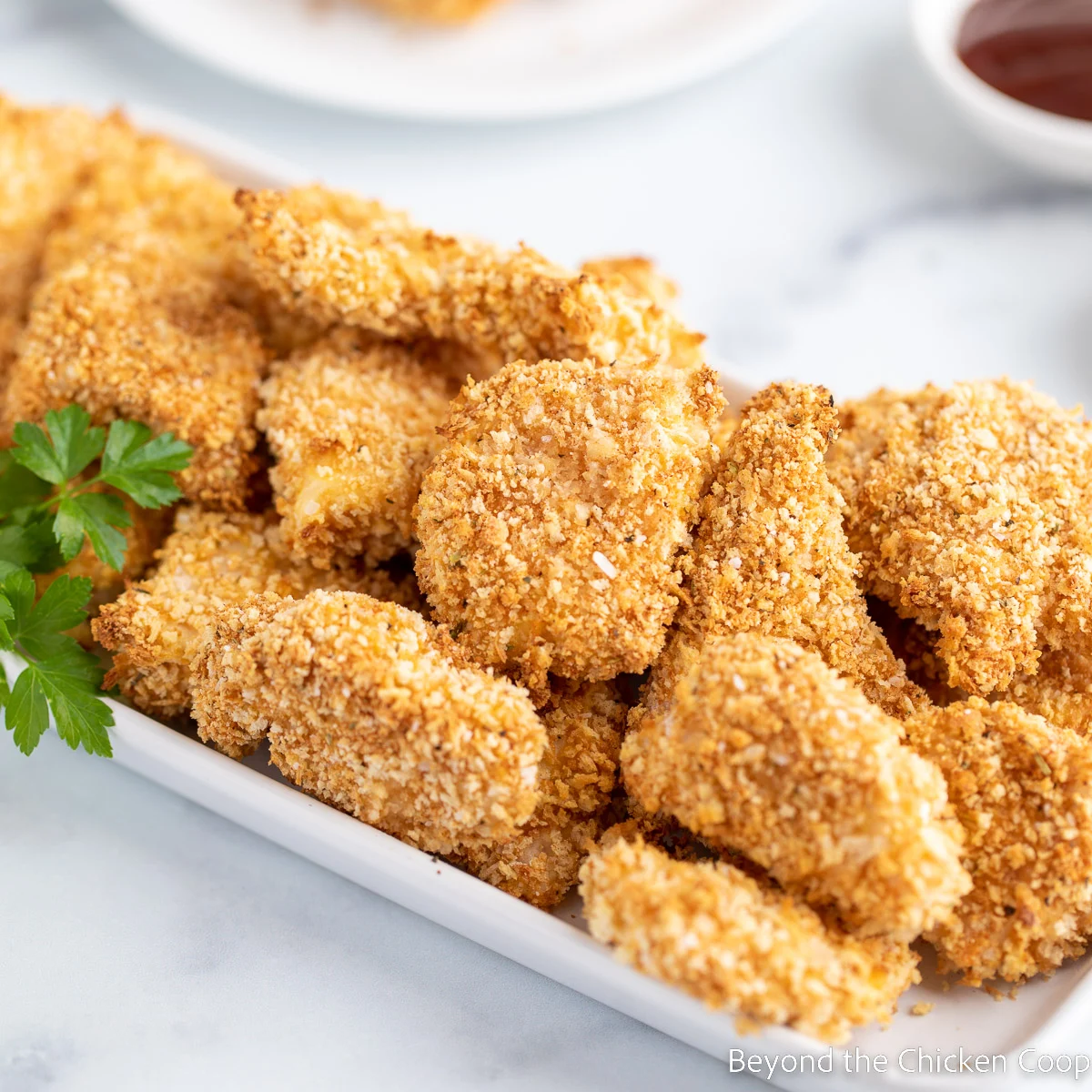 Perfectly breaded and cooked chicken nuggets, highlighting the precision and quality achieved with Alfa Food & Poultry Projects’ advanced nugget production lines